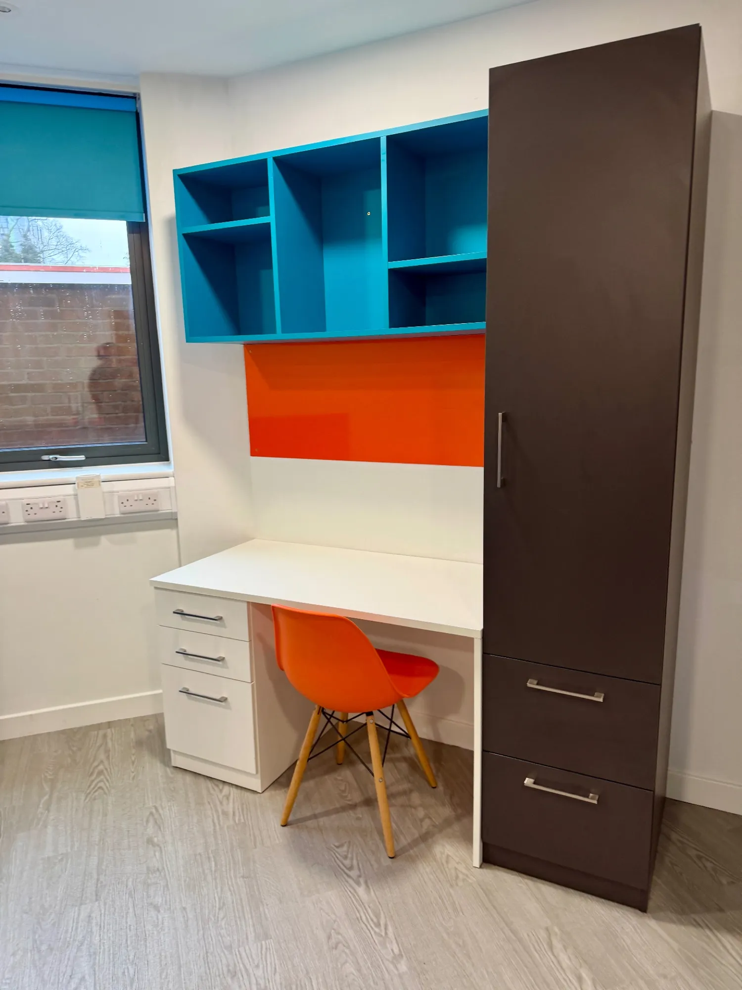 In-room study desk and wardrobe at Northgate House Derby